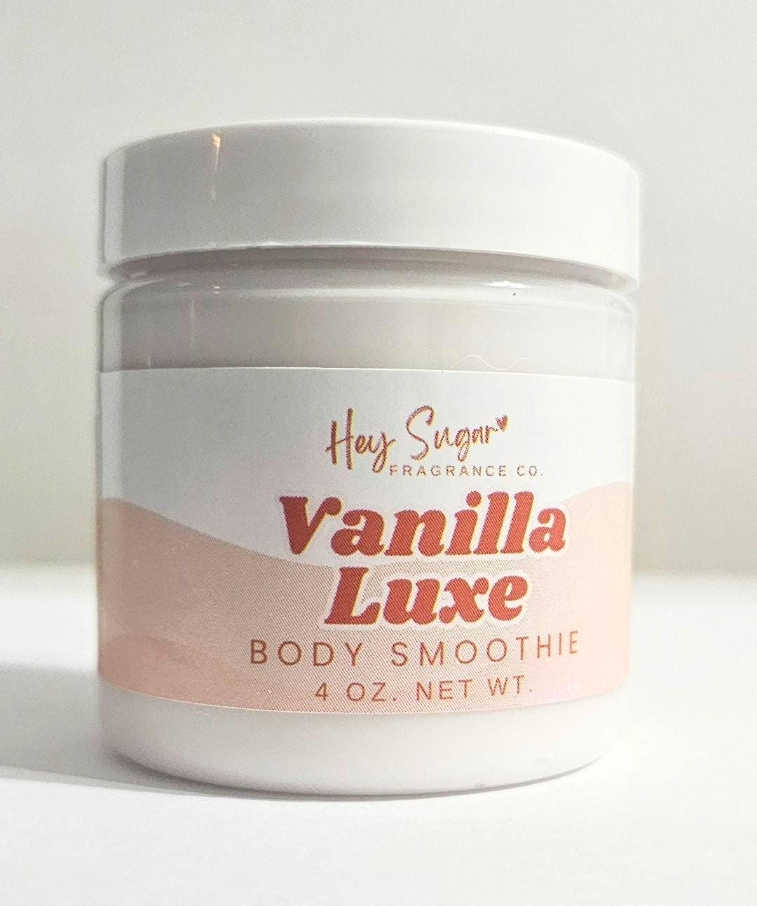 Vanilla Luxe Body Smoothie – a rich, whipped vanilla body butter that deeply nourishes and hydrates. This organic body lotion doubles as a skin moisturizer and body butter scrub. Perfect vegan skincare and spa gift for her! Scented with Escapade Gourmand fragrance, layer with your perfume for beast mode fragrance. Pairs well with our Vanilla Luxe Perfume, which is richly scented comparable to Escapade Gourmand. Luxury vanilla, creme brulee, viral vanilla, rich auntie scent, hey sugar fragrance