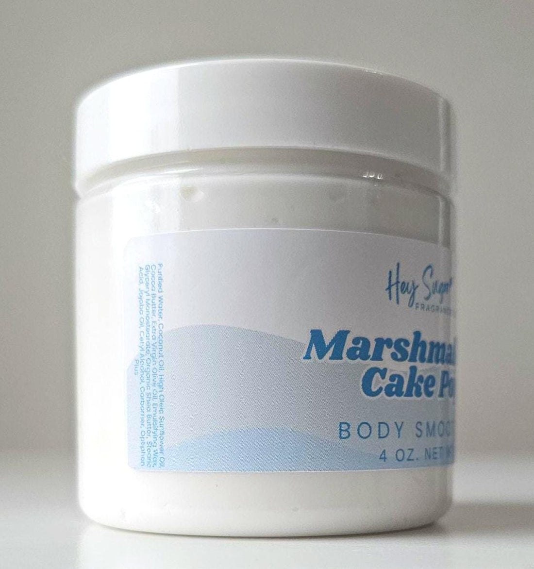 Marshmallow Cake Pop Body Smoothie – a rich, whipped vanilla body butter that deeply nourishes and hydrates. This organic body lotion doubles as a skin moisturizer and body butter scrub. Perfect vegan skincare and spa gift for her! Scented